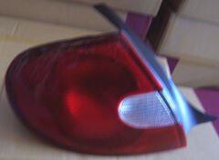 CHRYSLER NEON- 00/02; STOP LAMBASI SOL KIRMIZI/BEYAZ (TYC) 5288527AJ