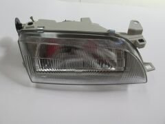 TOYOTA COROLLA- AE101- 93/98; FAR LAMBASI SAĞ MANUEL (ŞAPKASIZ) H4 (CASP) (E MARKLI) 81110-1E282
